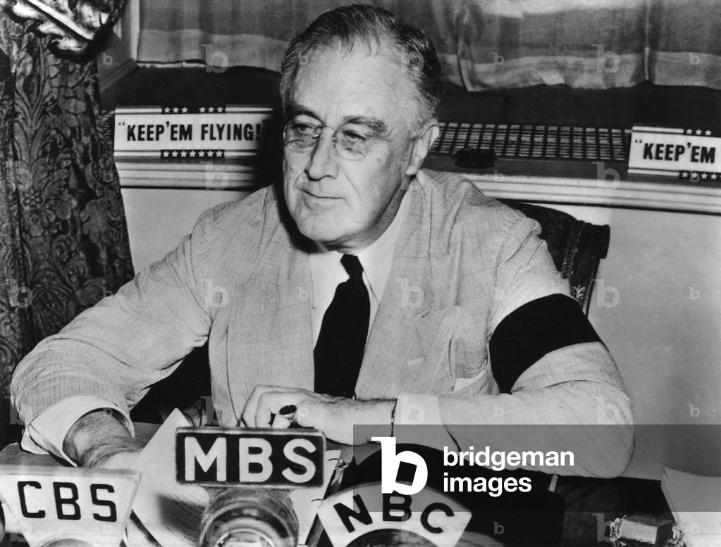 Franklin Roosevelt in Fireside Chat about German attacks on U.S. ships. Sept. 11, 1941. He asserted the U.S. would maintain freedom of the seas. He wears a black arm band in mourning for his mother
