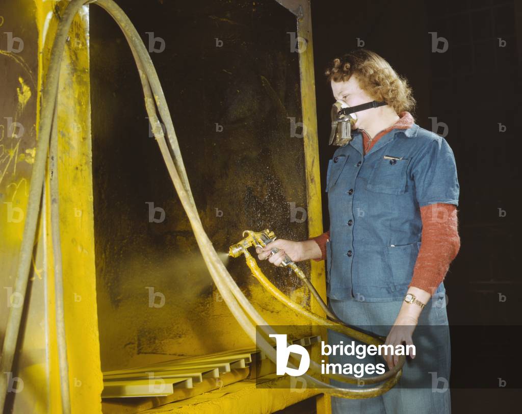 30 year old mother of two children, spraying small parts for U.S. Army gasoline trailer tanks. Heil Company, Milwaukee, Wisconsin. Feb. 1943