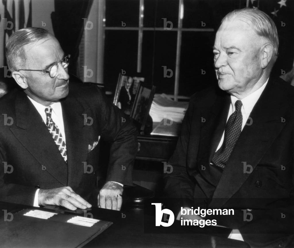 Former President Herbert Hoover (right), confers with President Harry Truman, on his findings concerning the food situation in the world, June 20, 1946