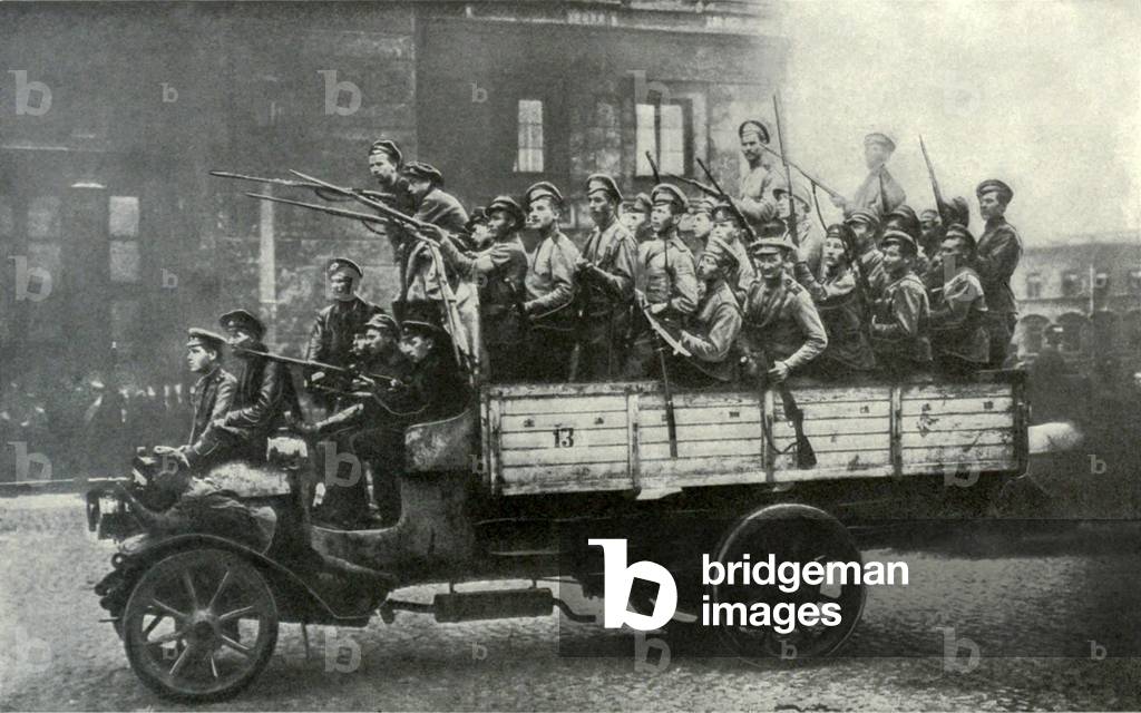 Truckload of excited soldiers during Russian Revolution. St. Petersburg, 1917