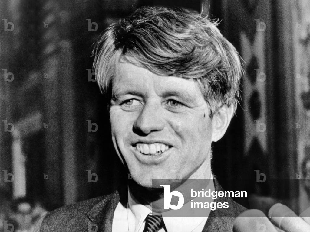 Sen. Robert Kennedy talking with reporters on this 42nd birthday. Nov. 20, 1967