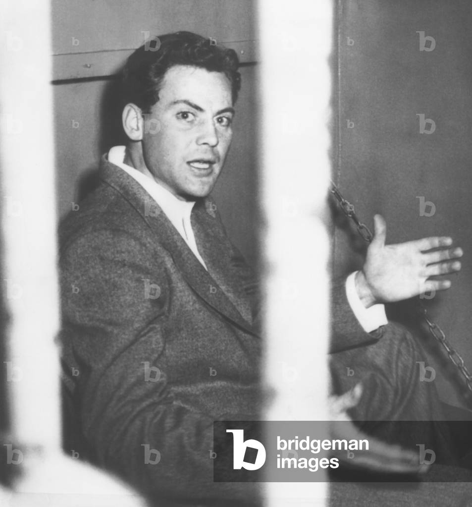 Actor John Agar, protests photographers taking his picture after his drunk driving arrest. Feb. 12, 1950. The 29 year old actor was recently divorced from Shirley Temple