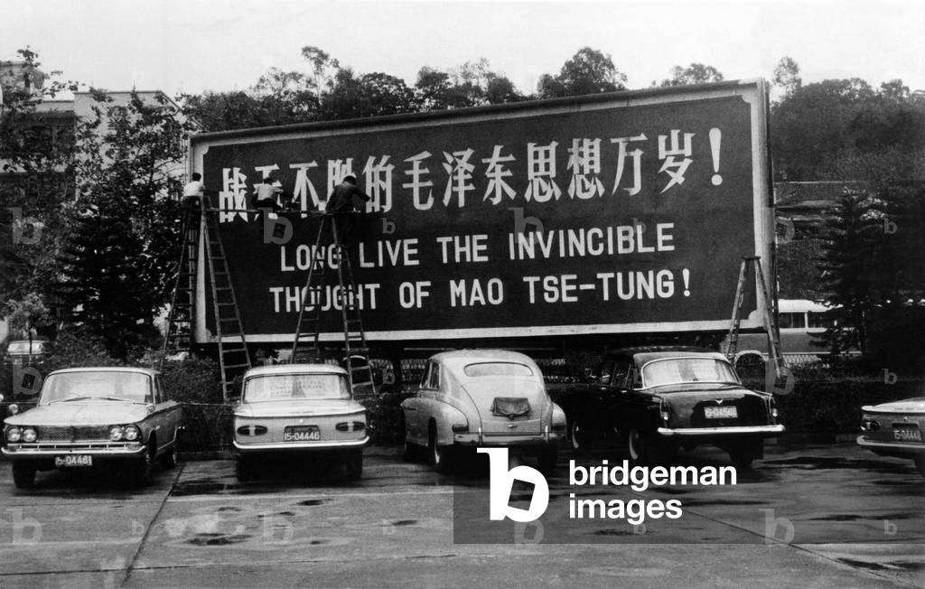 Billboard from the Chinese Communist Cultural Revolution. For the benefit of English speaking guests of a Shanghai Hotel, it is translated as, 'Long Live the Invincible Thought of Mao Tse-Tung'. May 18, 1967