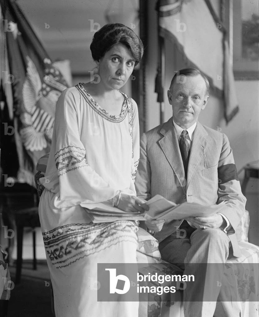 President Calvin Coolidge (1872-33), wearing a black mourning armband, and his wife two days after the sudden death of President Warren Harding on Aug. 2, 1923