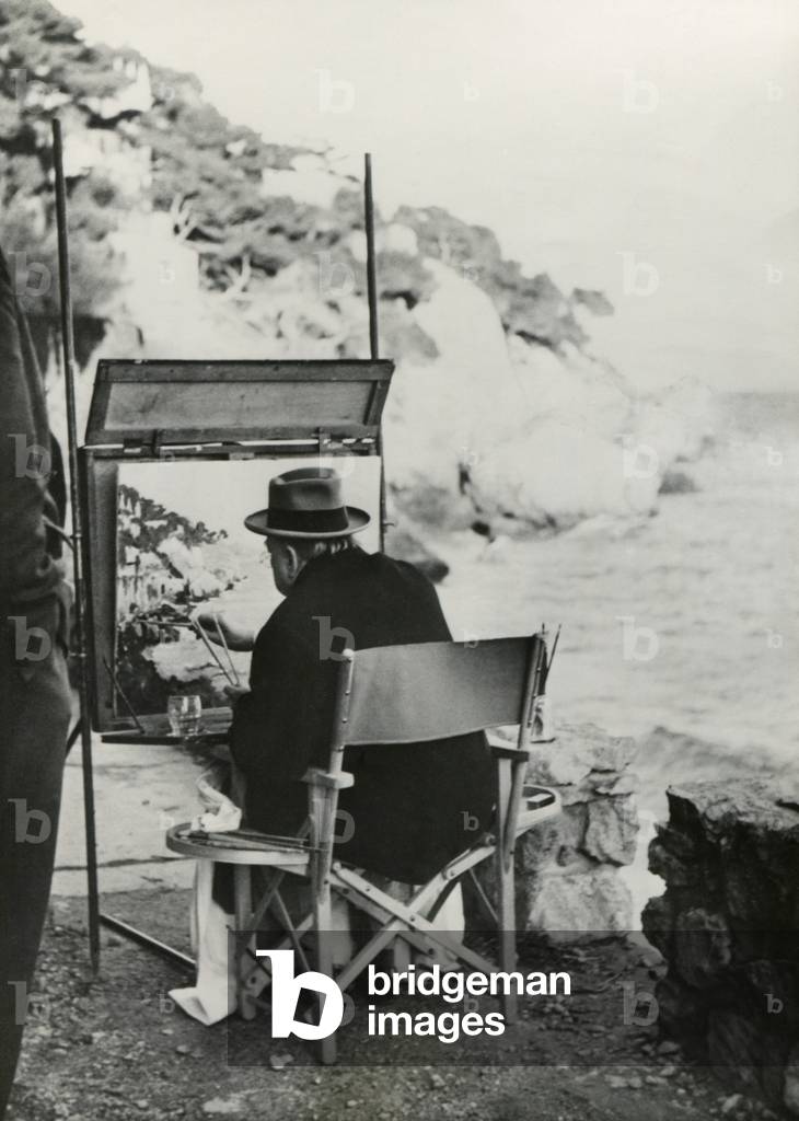 Ex-Prime Minister Winston Churchill painting on the French Riviera near Monte Carlo. Jan 12, 1949.