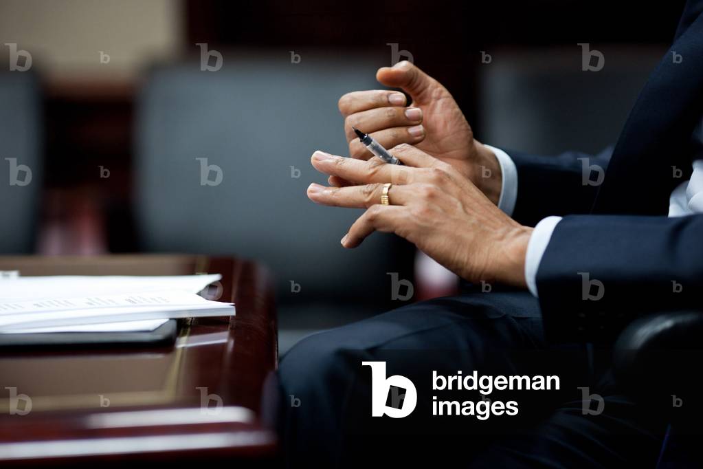 President Obama's hands gesture during a briefing on the situation in Libya with members of Congress in White House Situation Room. March 25 2011. (BSWH_2011_8_131)