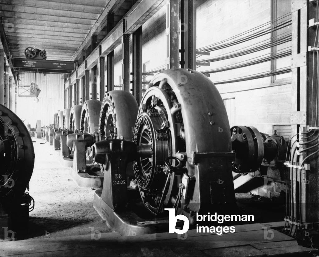 Electrical generators in Edison Sault Power Plant at Sault Ste. Marie, Michigan were powered by the 21 foot drop of Saint Mary's River between Lakes Superior and Huron. The power plant was the longest in the world in 1902 and it's generating power was exceeded only by the Niagara Falls works