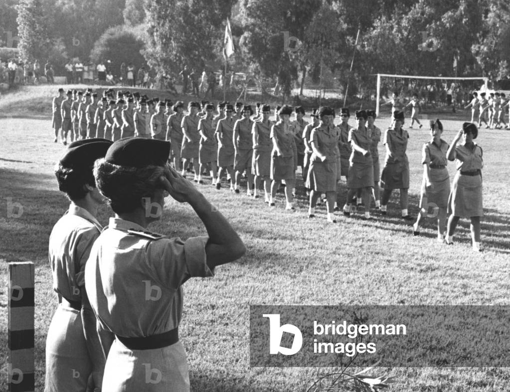 Arab-Israeli war: members of the Israeli Women's Army Corps being saluted by commander colonel Stella Levy (l.) during a parade ground ceremony in Tel Aviv, c. 1967