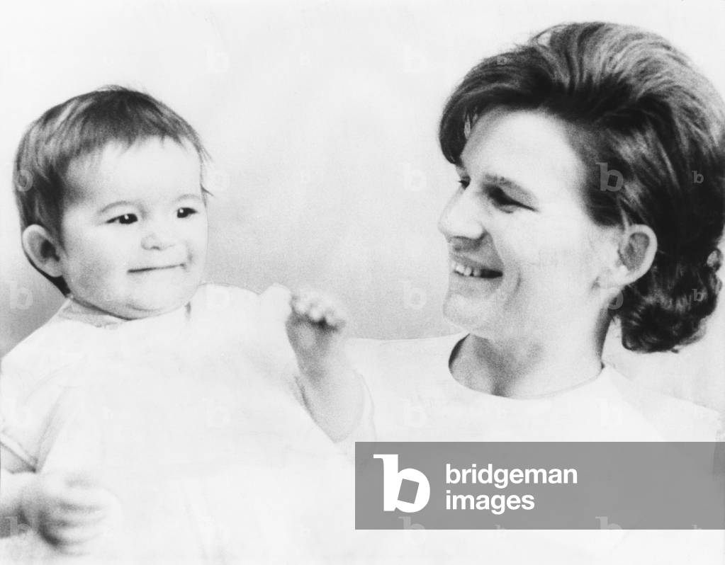 Russian cosmonaut Valentina Nikolayeva-Tereshkova with her one-year-old daughter, Alyenushka. Valentina married cosmonaut Adrian Nikolayeva shortly after she became the first woman to be launched into space. Valentina became a prominent member of the Communist Party of the Soviet Union, and remained politically active following the collapse of the USSR in 1991