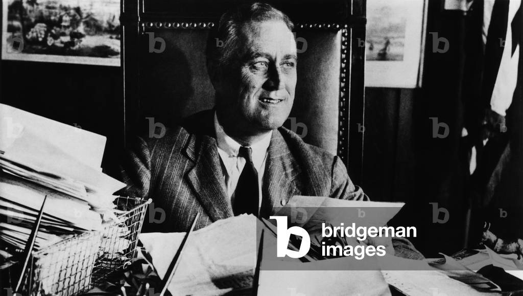 Future President Franklin D. Roosevelt (1882-1945), U.S. President 1933-1945, as Governor of New York, sitting in his 'Governor's chair', Albany, c.early 1930s