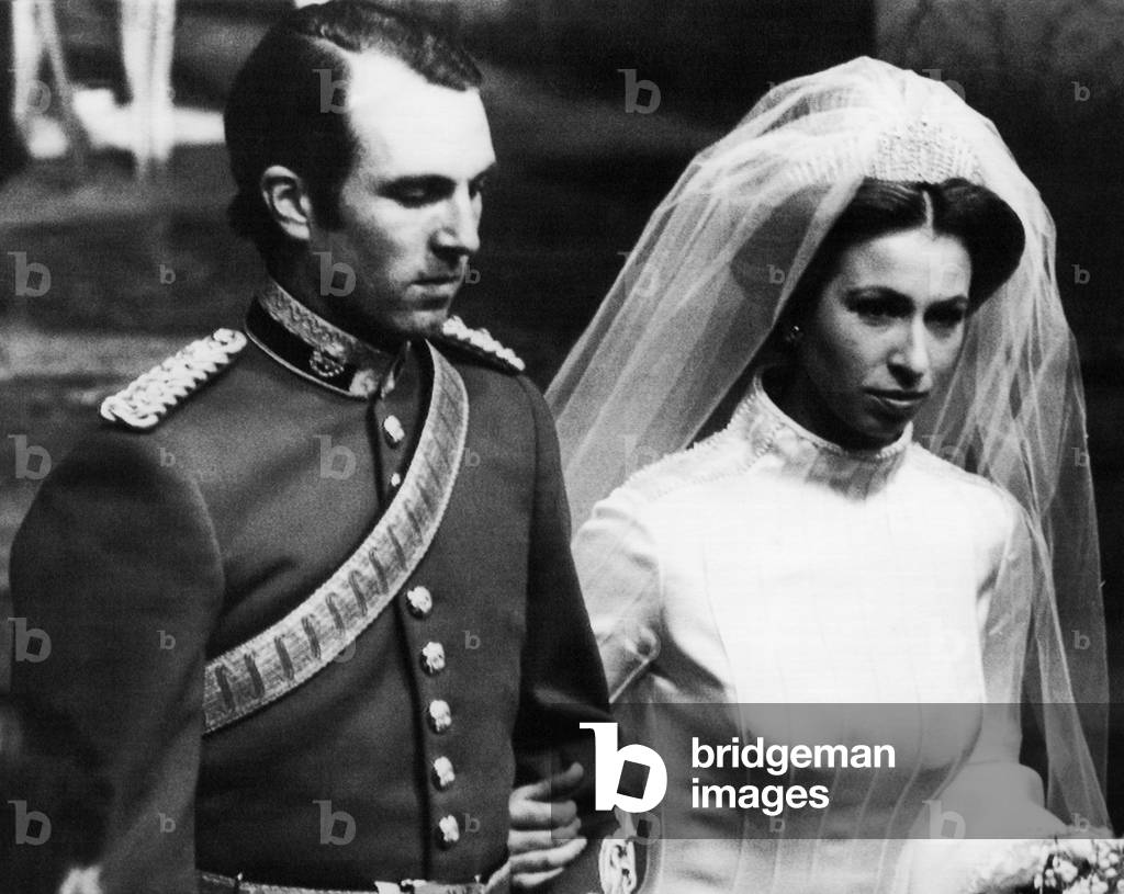 Princess Anne (right), and her husband Lieutenant Mark Phillips (left), walk down the aisle of Westminster Abbey, following their wedding ceremony, November 14, 1973
