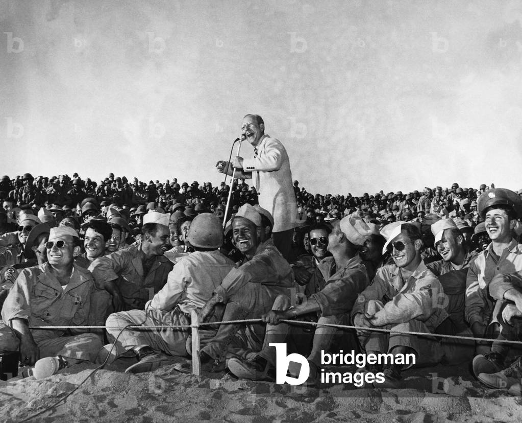 Bandleader Kay Kyser entertaining the troops at the Desert Training Center in California, October 31, 1942