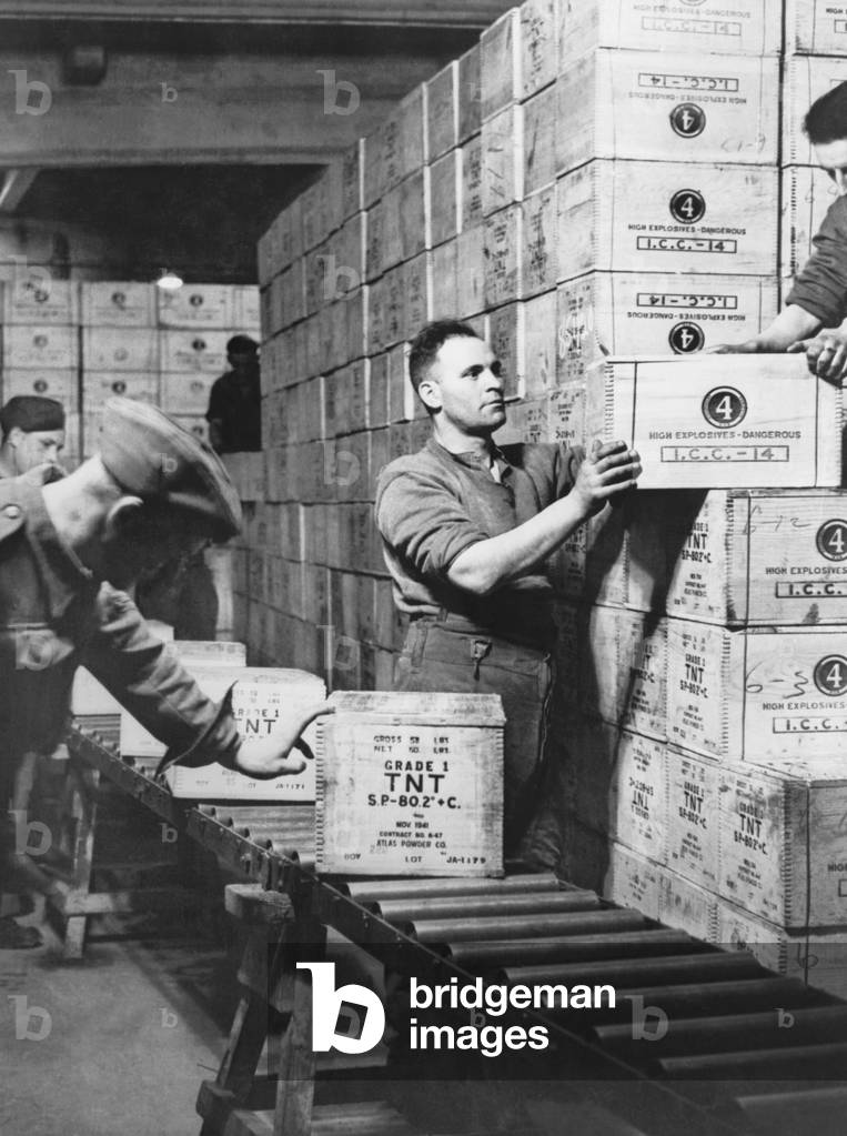 T.N.T. gunpowder shipped under the Lend-Lease program in a tunnel 100 feet under ground. The space was dug out of solid rock in western England. c. 1940-43. World War 2