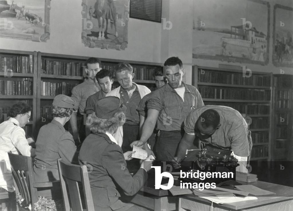 San Quentin prisoners applying for wartime employment. San Quentin inmates made hundreds of cable submarine nets as well as multipurpose cargo nets. At other prisons, inmates sewed uniforms, manufactured air-raid sirens, and wooden assault boats. c. 1943