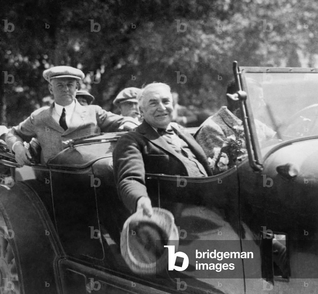 President Warren Harding riding in a car in Florida, March 1923. On a golf vacation with friends he became tired before he finished each round of golf, indicating his health was declining