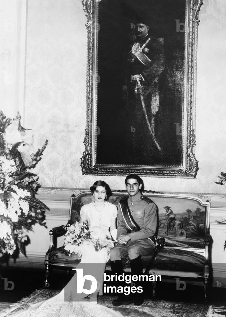 Crown Prince Mohammed Reza of Iran and his Egyptian bride, Princess Fawzia. She is the sister of King Farouk of Egypt and the first of the future Shah of Iran's three wives. March 30, 1939