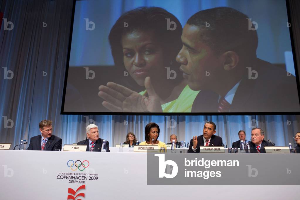 President and Michelle Obama answer questions following the 'Chicago 2016' presentation for the 2016 Summer Olympic Games in Copenhagen Denmark. Oct. 2 2009. With the Obamas from left are Bob Crvrtlik Chicago 2016 Vice Chairman Patrick Ryan Chicago 2016 Chairman and Mayor Richard M. Daley. Oct. 2 2009.,