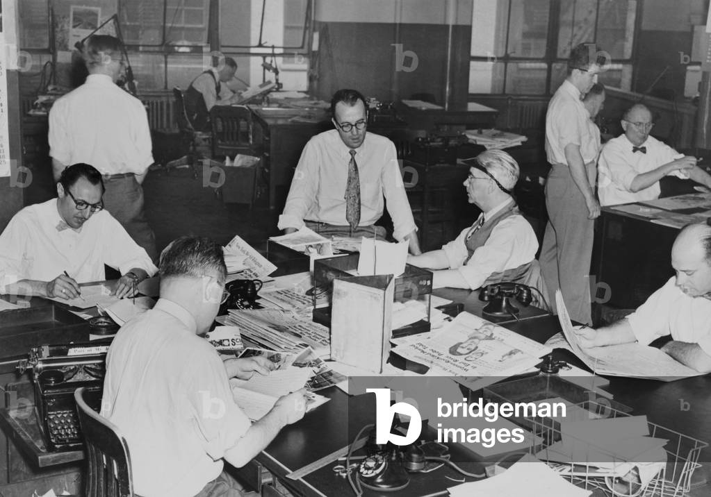 The City Desk, the department that handled local news. In the offices of the New York World-Telegram and the Sun Newspaper. May 12, 1949.