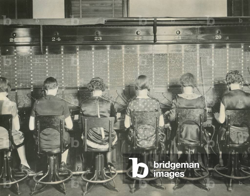 Back view of young women telephone switchboard operations. Washington, D.C., April 7, 1927