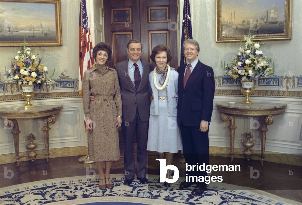 Vice President and Joan Mondale pose for a portrait in the Oval Office with President and Roselyn Carter. c. 1977-1980