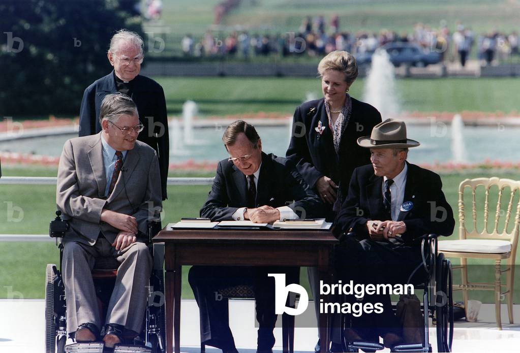 President Bush signs into law the Americans with Disabilities Act of 1990 on the South Lawn of the White House. Washington, D.C. January 20, 1993