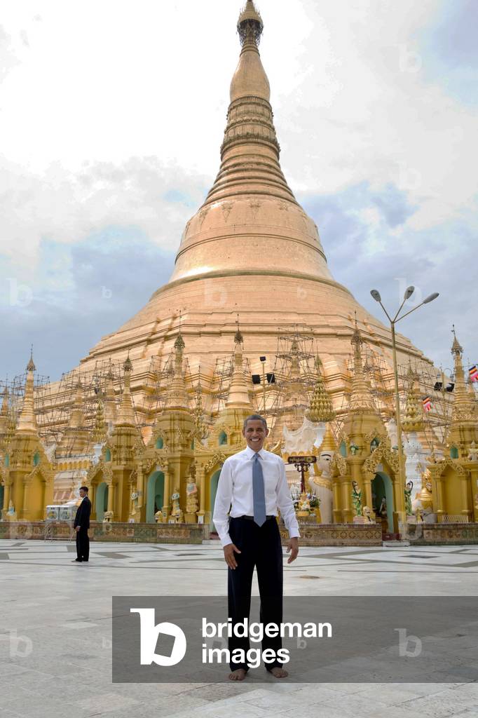 President Barack Obama with bare feet in front of the Shwedagon Pagoda. All visitors must remove their shoes and socks while touring the pagoda. Yangon, Myanmar (Rangoon, Burma), Nov. 19, 2012