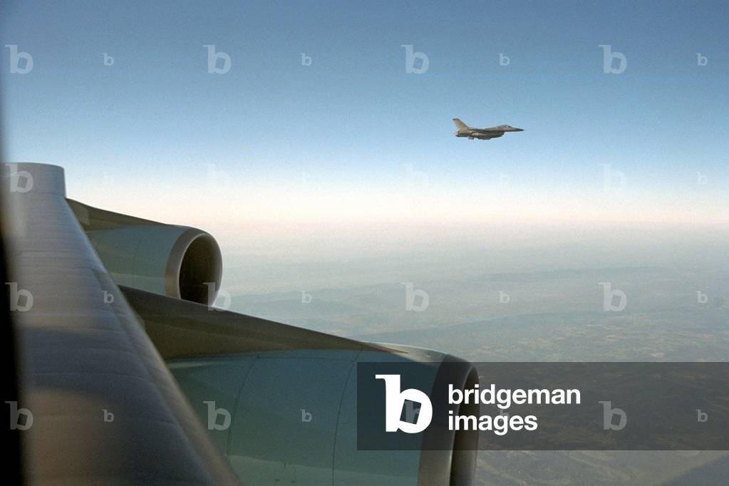 An F-16 escorting Air Force One from Offutt Air Force Base in Neb. to Andrews Air Force Base. Sept. 11, 2001. After the 9-11 Terrorists attacks, jet fighters were scrambled to patrol the airspace above Washington, D.C. and New York City