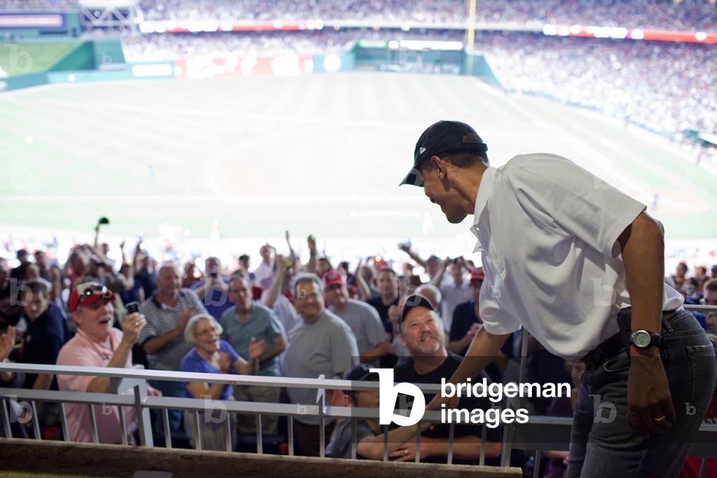 President Barack Obama greets baseball fans during a Washington Nationals vs. Chicago White Sox baseball game at Nationals Park in Washington D.C. June 18 2010.,