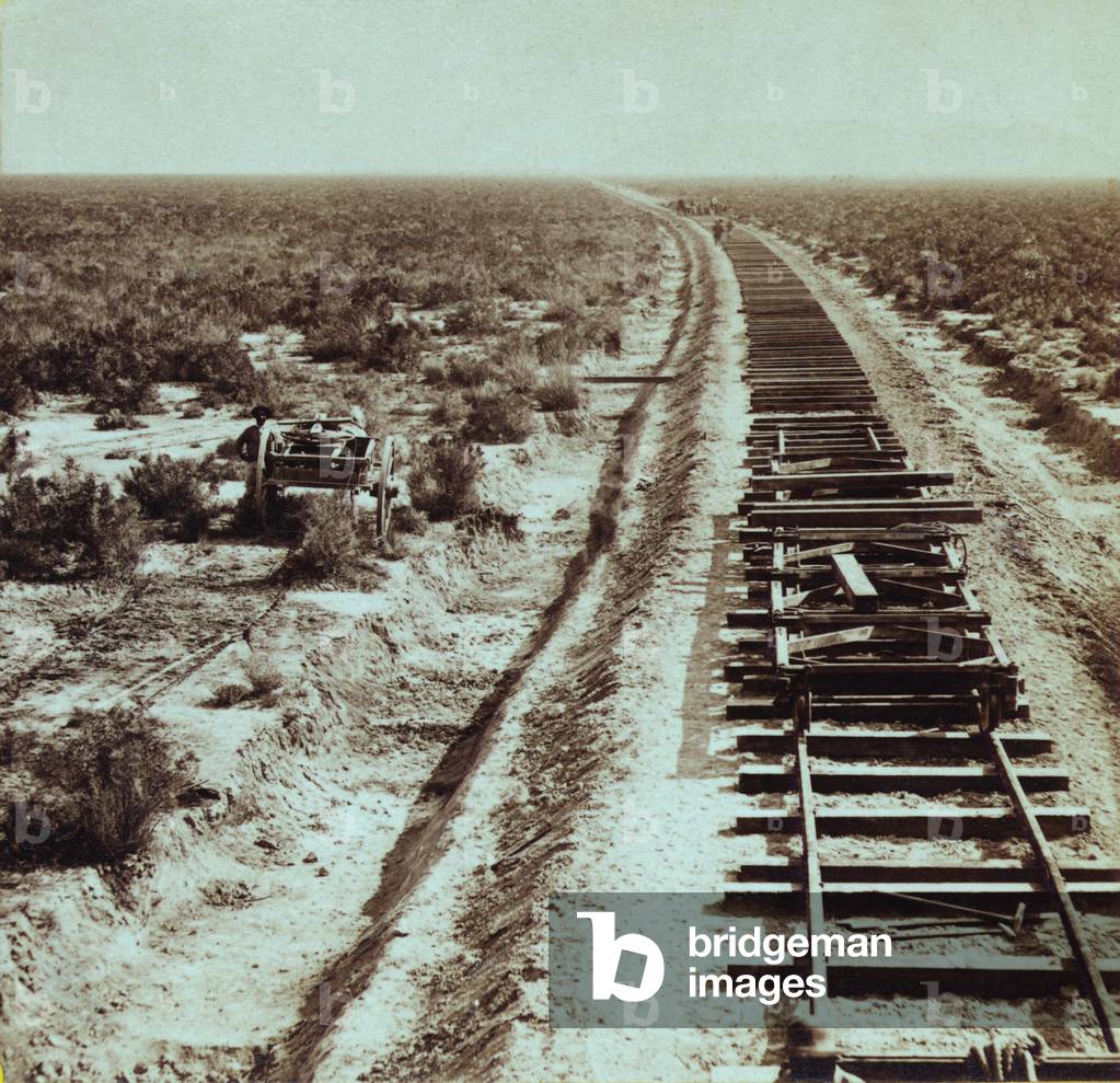 ADVANCE OF CIVILIZATION. Railroad tracks under construction near Iron Point in the vicinity of the Humboldt River Nevada. Photo by Alfred A. Hart between 1865-1869. LC-DIG-stereo-1s00621_CROP