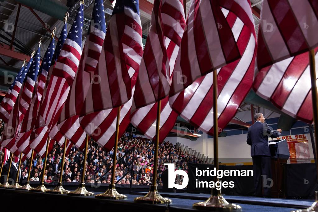 President Barack Obama speaks on immigration reform in Las Vegas, Nev., Jan. 29, 2013. He spoke in front of a display of American flags at Del Sol High School
