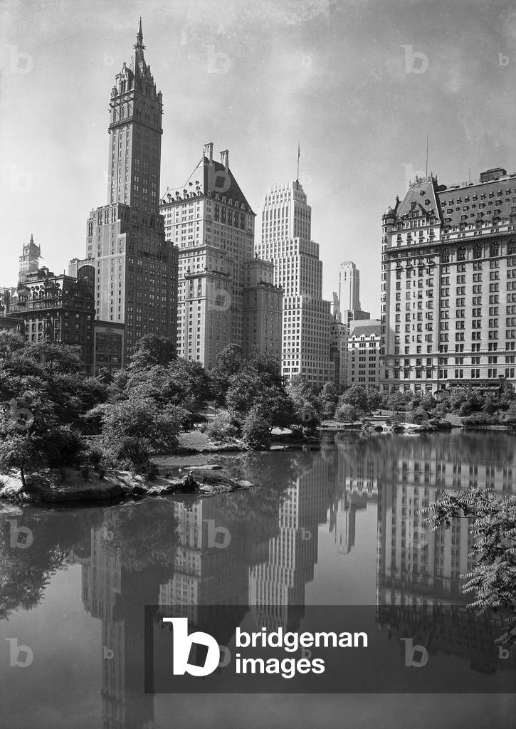 New York City, view of plaza buildings over park lake, photograph by Samuel H. Gottscho, January 23, 1933