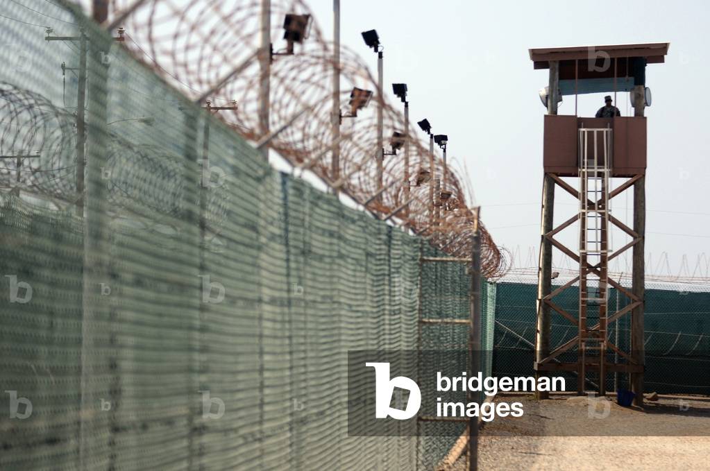 U.S. Soldier stands watch in a guard tower at Camp Delta in Guantanamo Bay Naval Base Cuba June 8 2010., Photo by:Everett Collection
