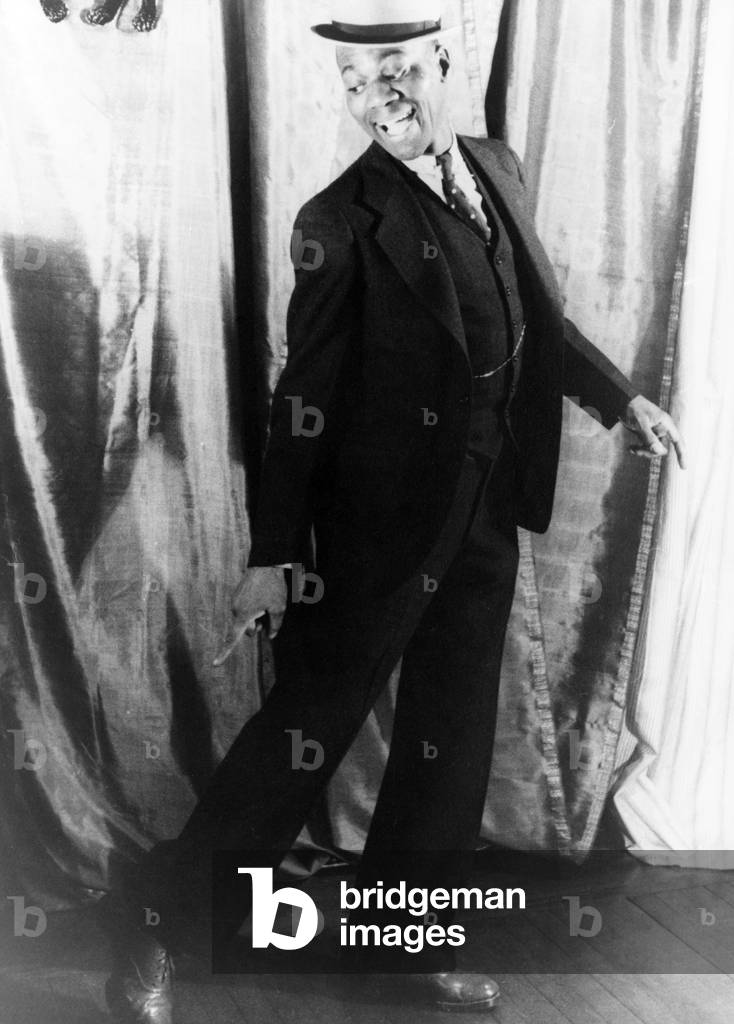 Bill Robinson (1878-1949), also known as Bojangles, was a vaudeville star who became a supporting character in many Shirley Temple movies: THE LITTLE COLONEL (1935), IN OLD KENTUCKY (1935), THE LITTLEST REBEL (1935), RECECCA OF SUNNY BROOKE FARM (1938), and JUST AROUND THE CORNER (1938)