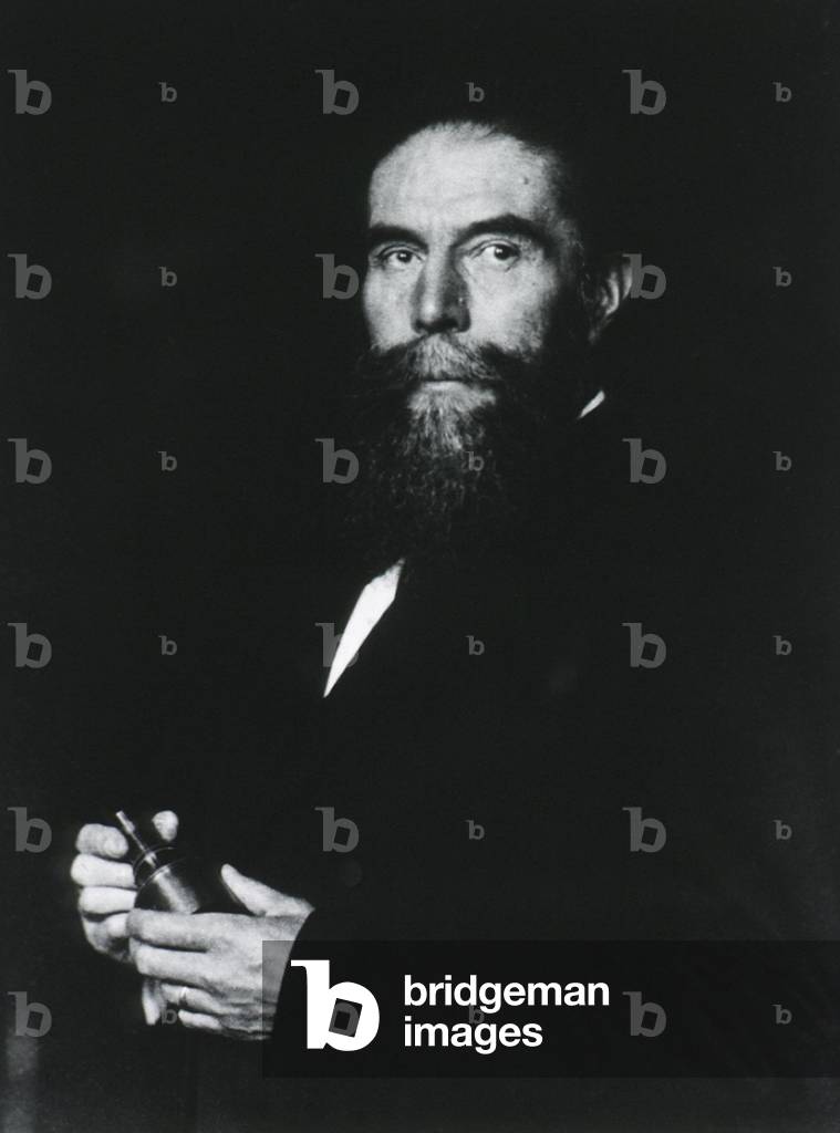 Wilhelm Roentgen (1845-1923), German physicist, discoverer of X-rays, holding a cathode-ray tube, the source of the x-ray radiation he discovered