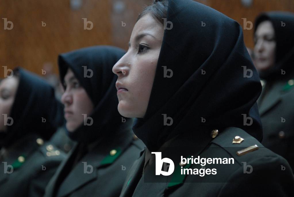 Women of the first graduating class of the Afghan National Army Female Officer Candidate School at their graduation ceremony. Sept. 23 2010., Photo by:Everett Collection