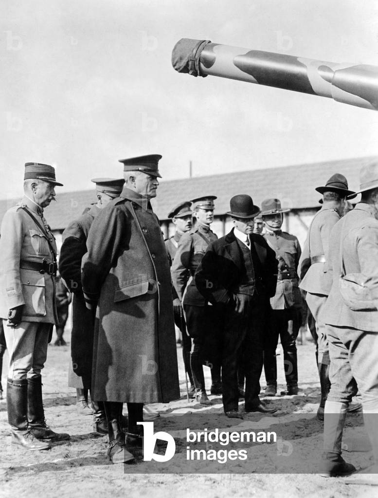 U.S. Army officer General John J. Pershing (arms behind back), c. 1918.