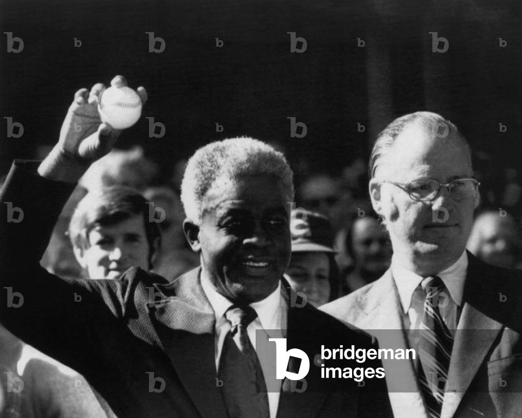 Jackie Robinson and Baseball Commissioner Bowie Kuhn, throwing out the first ball to Game 2 of the 1972 World Series, October 15, 1972
