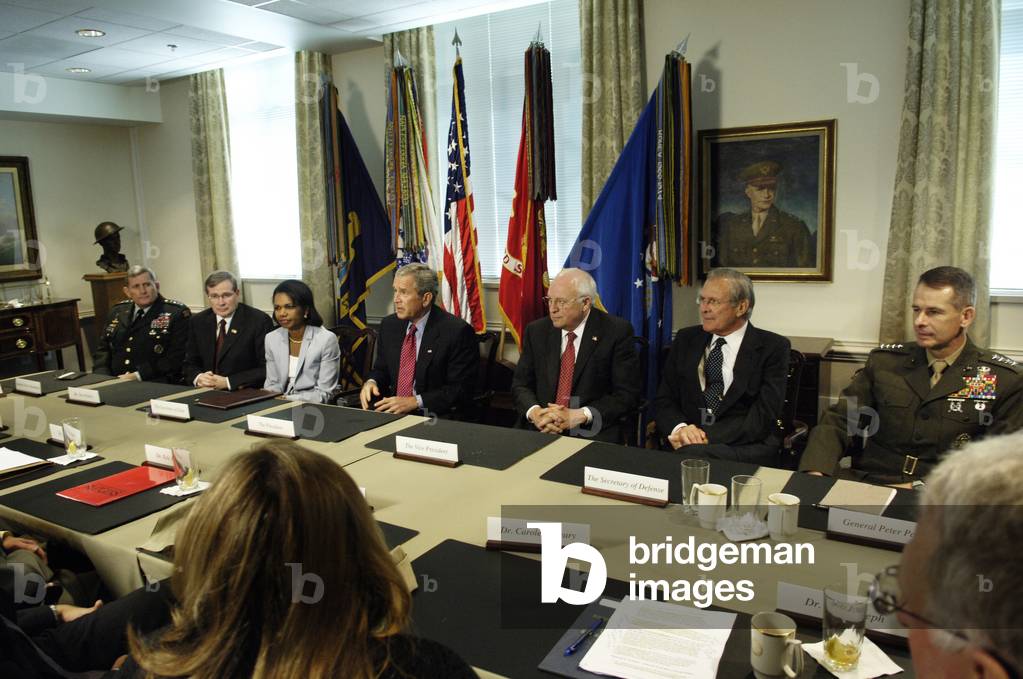 President George W. Bush and members of the National Security Council have lunch with Iraq experts following a briefing at the Pentagon. Aug. 14 2006