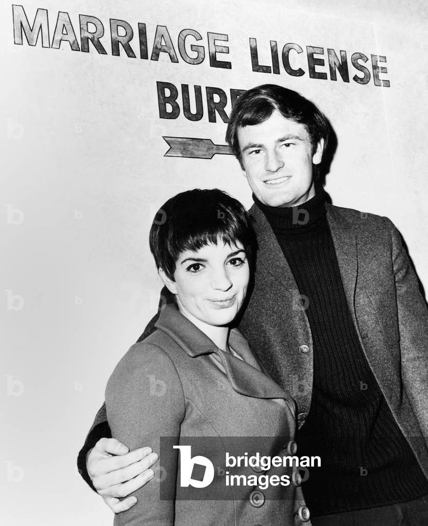 Liza Minnelli and Australian singer Peter Allen at the Marriage License Bureau. New York City, Feb. 20, 1967. The 20-year-old daughter of Judy Garland and Vincent Minelli and her 23-year-old fiance wed on March 3, 1967. Liza's parents Judy Garland and Vincente Minnelli, attended the wedding