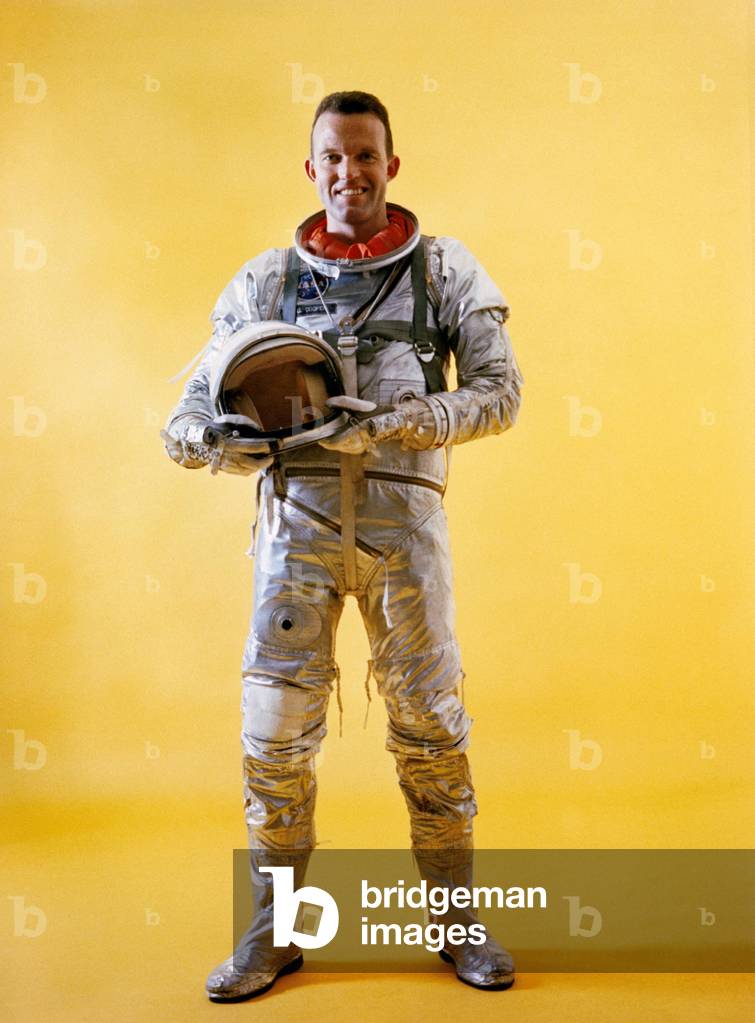 Mercury astronaut Gordon Cooper wearing a spacesuit. His Mercury capsule's electricity failed during the 16th orbit, requiring him to actively pilot the space capsule during reentry. Feb. 25, 1963