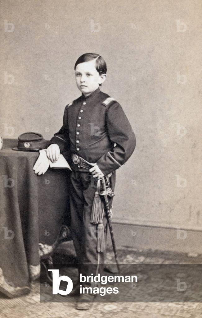 Thomas Tad Lincoln: Thomas 'Tad' Lincoln (1853-1871), youngest son of President Abraham and Mary Lincoln wearing a military style uniform. Ca. 1863. Portrait by Mathew Brady.