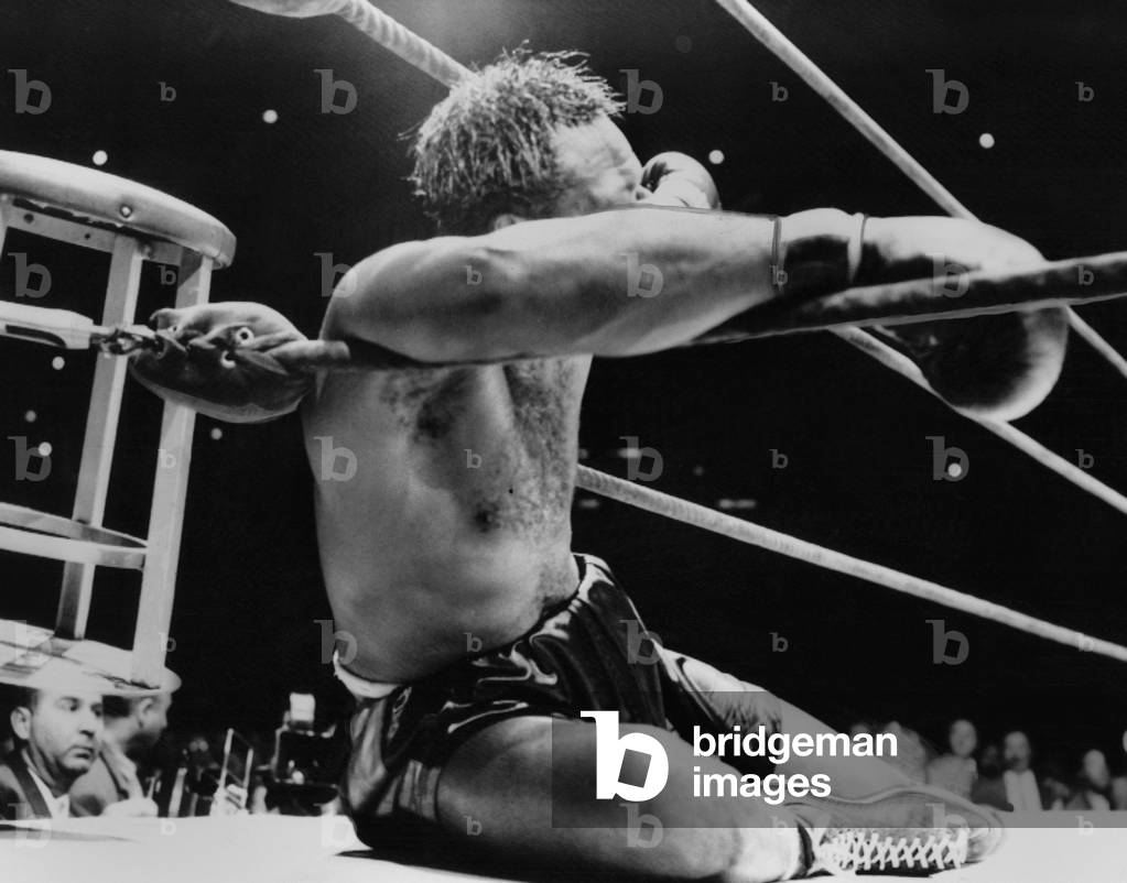 Archie Moore knocked out by Heavyweight Champion Rocky Marciano, Sept. 21, 1955. It was the 9th round of their title fight at Yankee Stadium, New York City