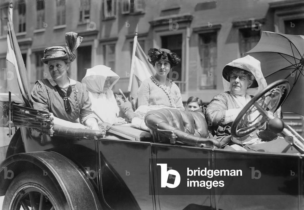 Women's suffrage leaders in an open car at a Votes for Women parade in New York City. Photo shows Susan Walker Fitzgerald, Emma Bugbee, Maggie Murphy, and Harriot Stanton Blatch. Blatch was the daughter of 19th century women's rights leader Elizabeth Cady Stanton. July 30, 1913
