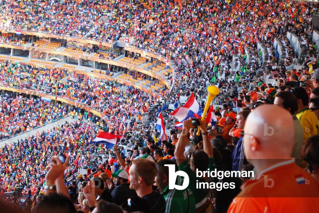 Fans cheer during the Netherlands vs. Denmark World Cup soccer match at Soccer City Stadium in Johannesburg South Afric. June 14 2010