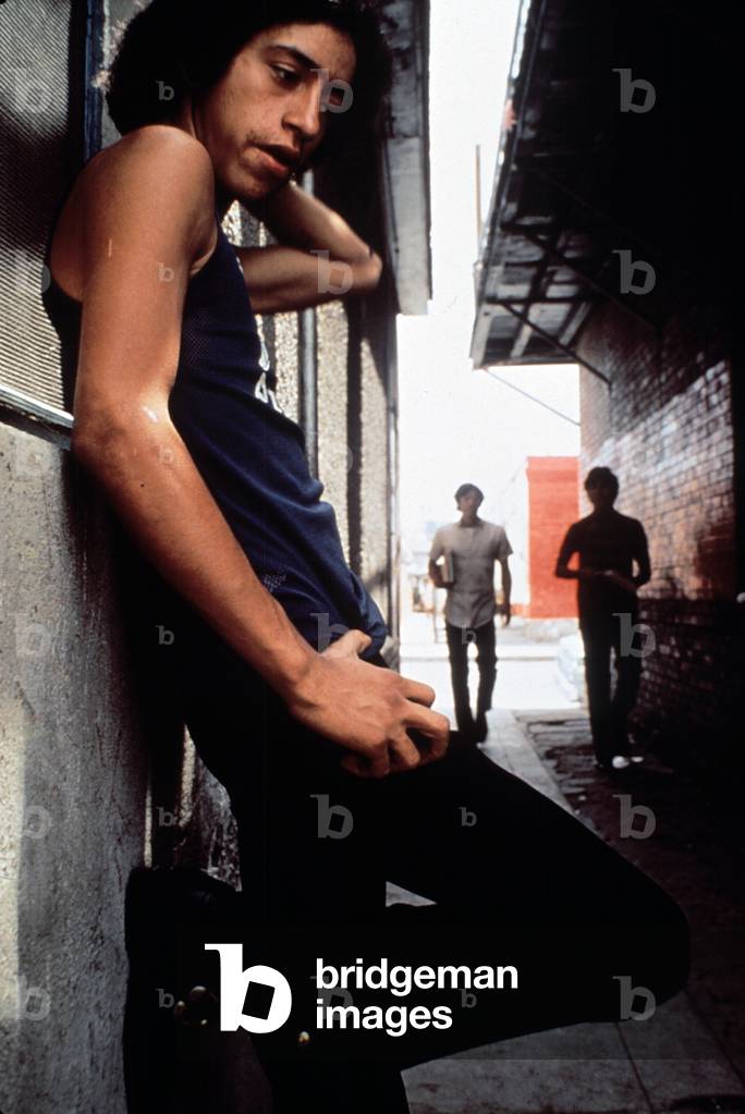 1970s Americ. Three young chicano men in the barrio area of El Paso, Texas c. 1973