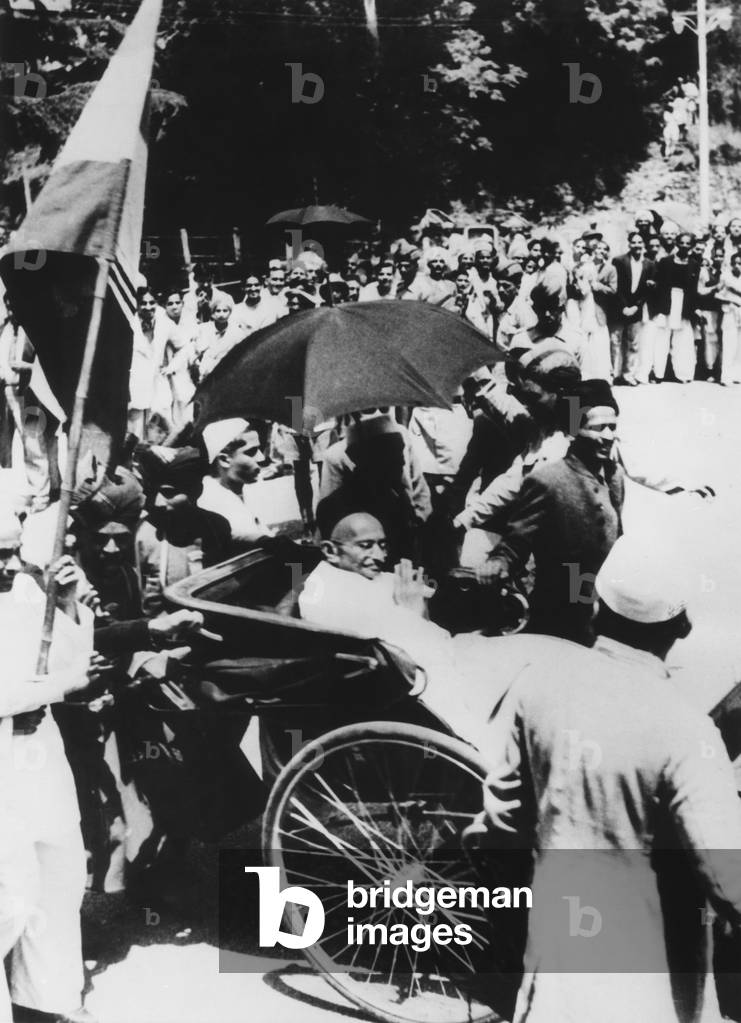 Mahatma Gandhi seated in a carriage to call on Viceroy Lord Wavell prior to the Simla Conference. July 1945. Gandhi was not a delegate to the conference, but the Indian National Congress was represented by Maulana Azad. The Conference ended in deadlock because of Hindu and Muslim differences