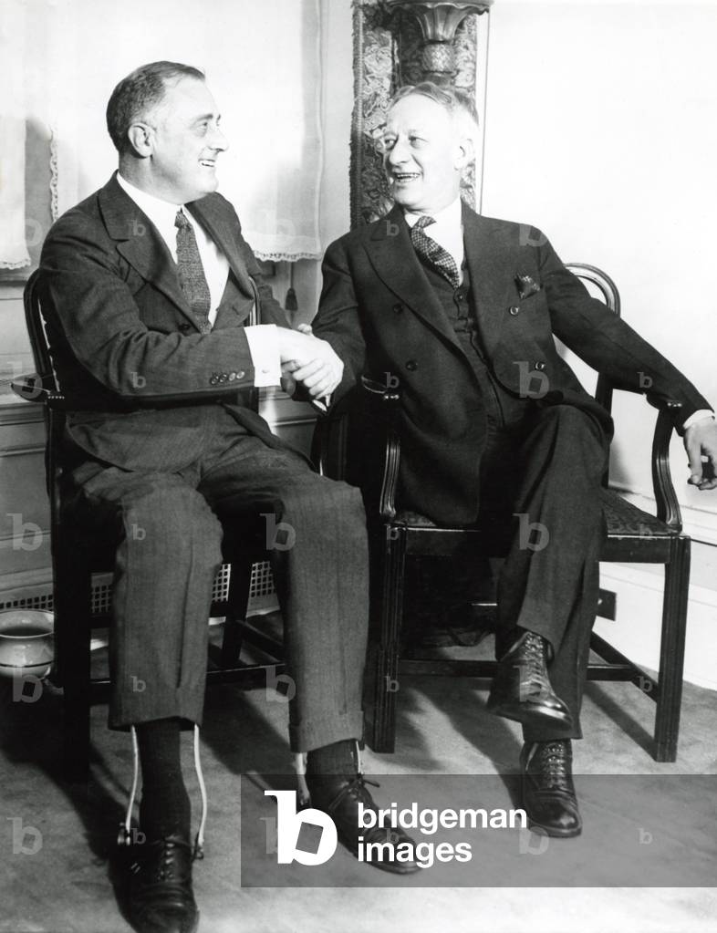 Governor Franklin Roosevelt shakes hands with Alfred E. Smith in 1930. They supported each other in the 1920s, but became rivals for the 1932 Democratic Presidential nomination
