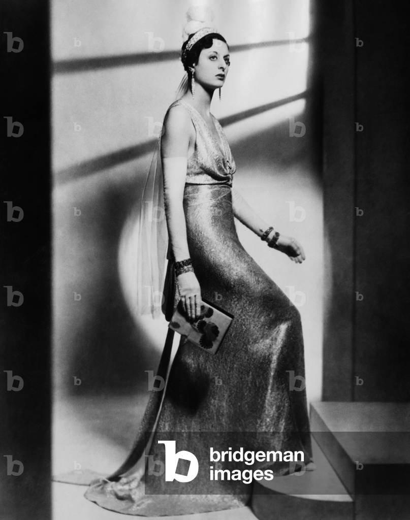 A Reville gown of rose-pink, and silver lame designed for women other than peeresses attending the Coronation ceremony, England, April 1937