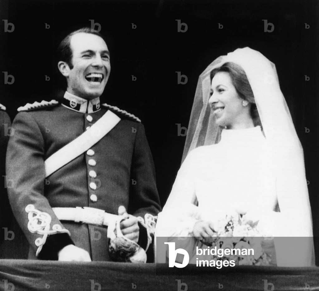 Princess Anne (right), and her husband Lieutenant Mark Phillips (left), following their wedding ceremony, at Buckingham Palace, November 14, 1973