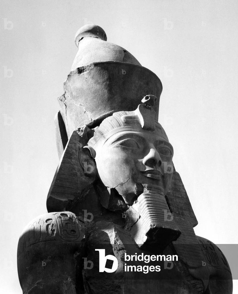 The head of the huge statue of Ramses II, one of Egypts most famous pharaohs, in the temple of Luxor that faces the Avenue of the Sphinxes